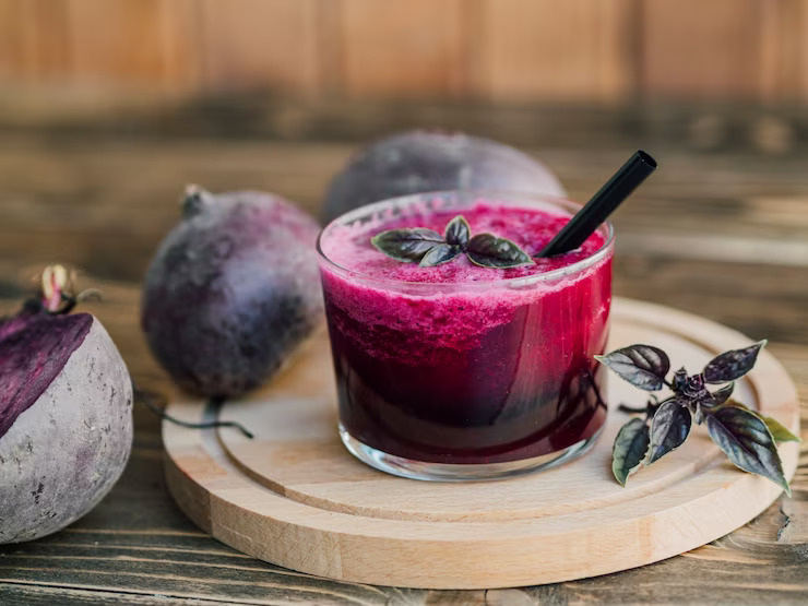 wooden tray with glass beetroot juic